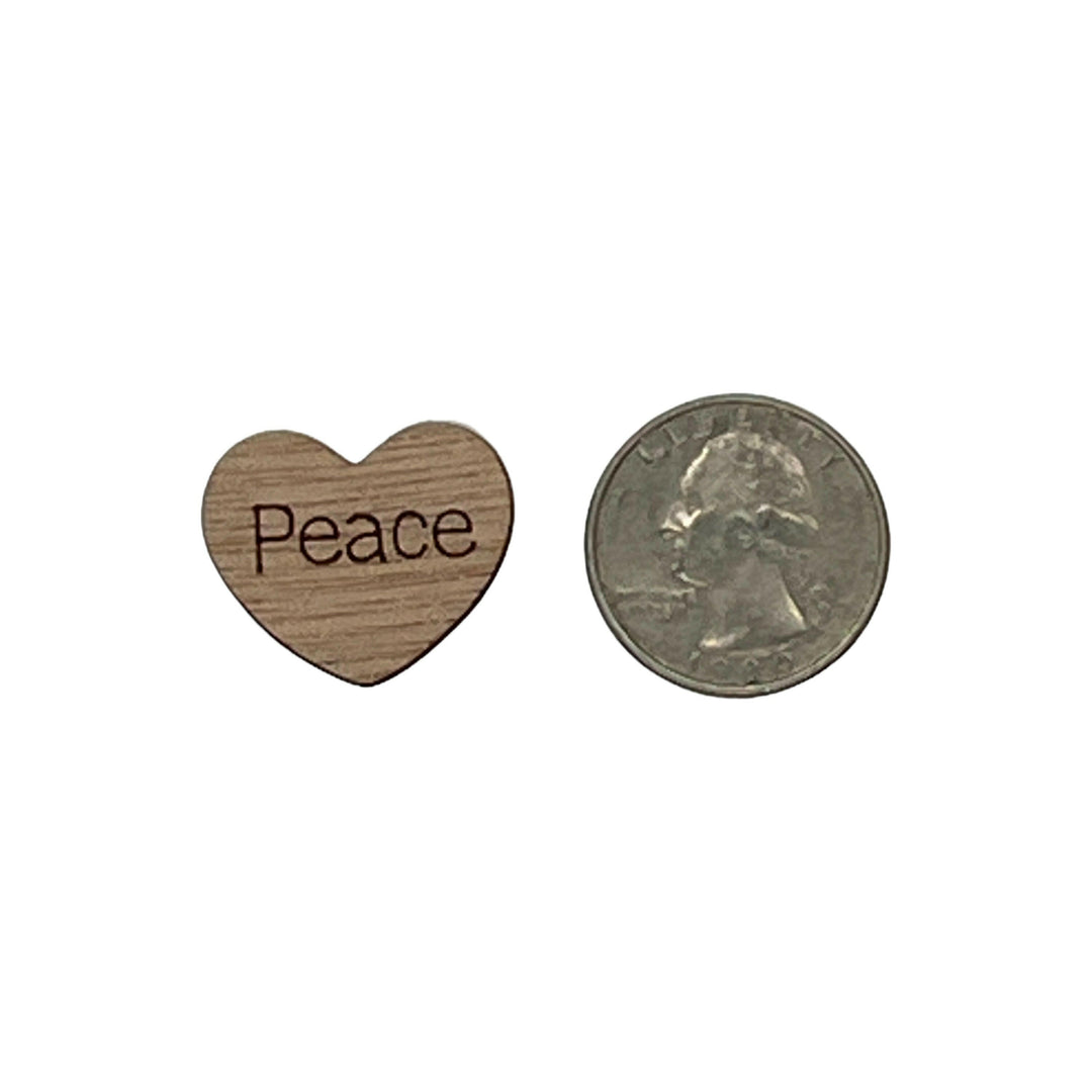 1 inch wood hearts with the word peace on them confetti