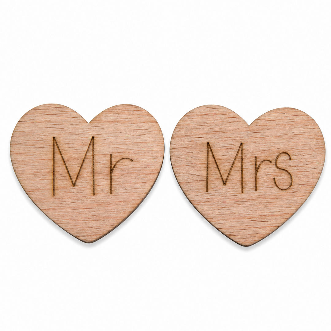 Mr and Mrs Wood shaped cutouts of hearts that are wood burned on with the words Mr and Mrs for wedding showers or bridal showers for country western boho western themes.