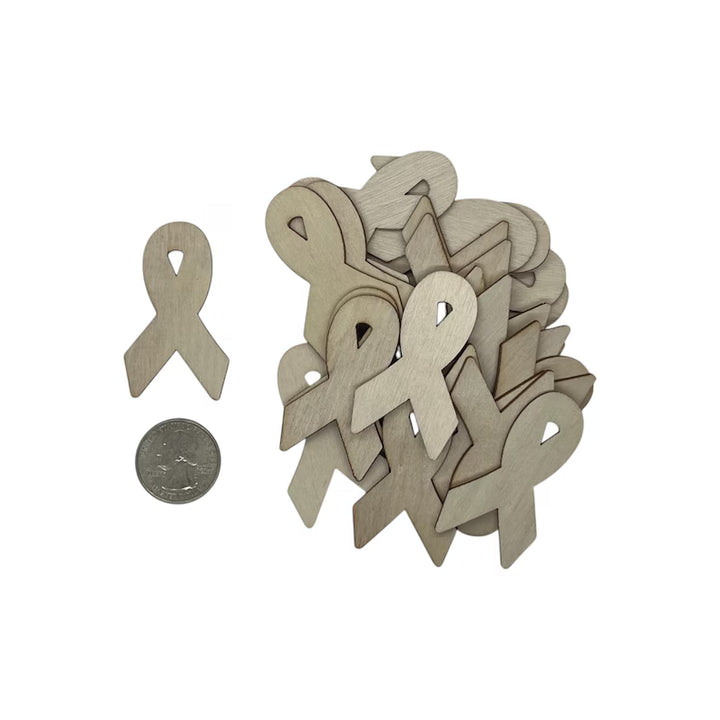 Wooden cutouts of awareness ribbons on a white background