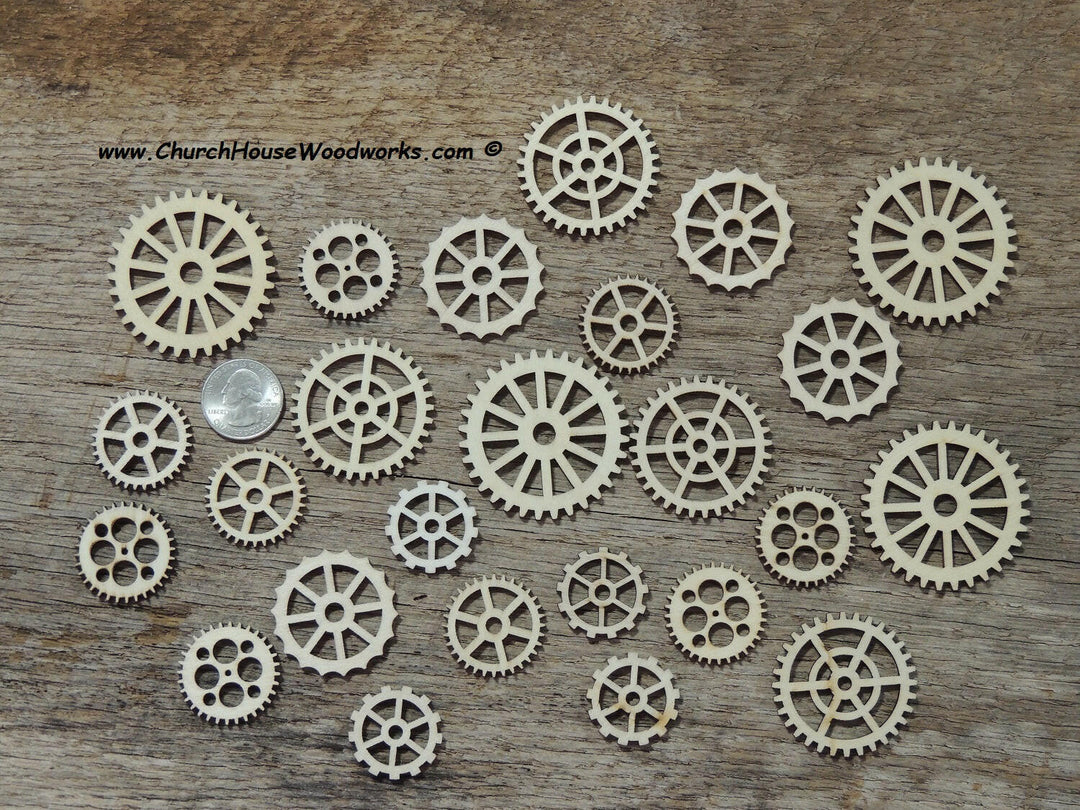 Assortment of intricately laser-cut wooden gears and cogs in various sizes, perfect for steampunk crafts, jewelry, and DIY projects